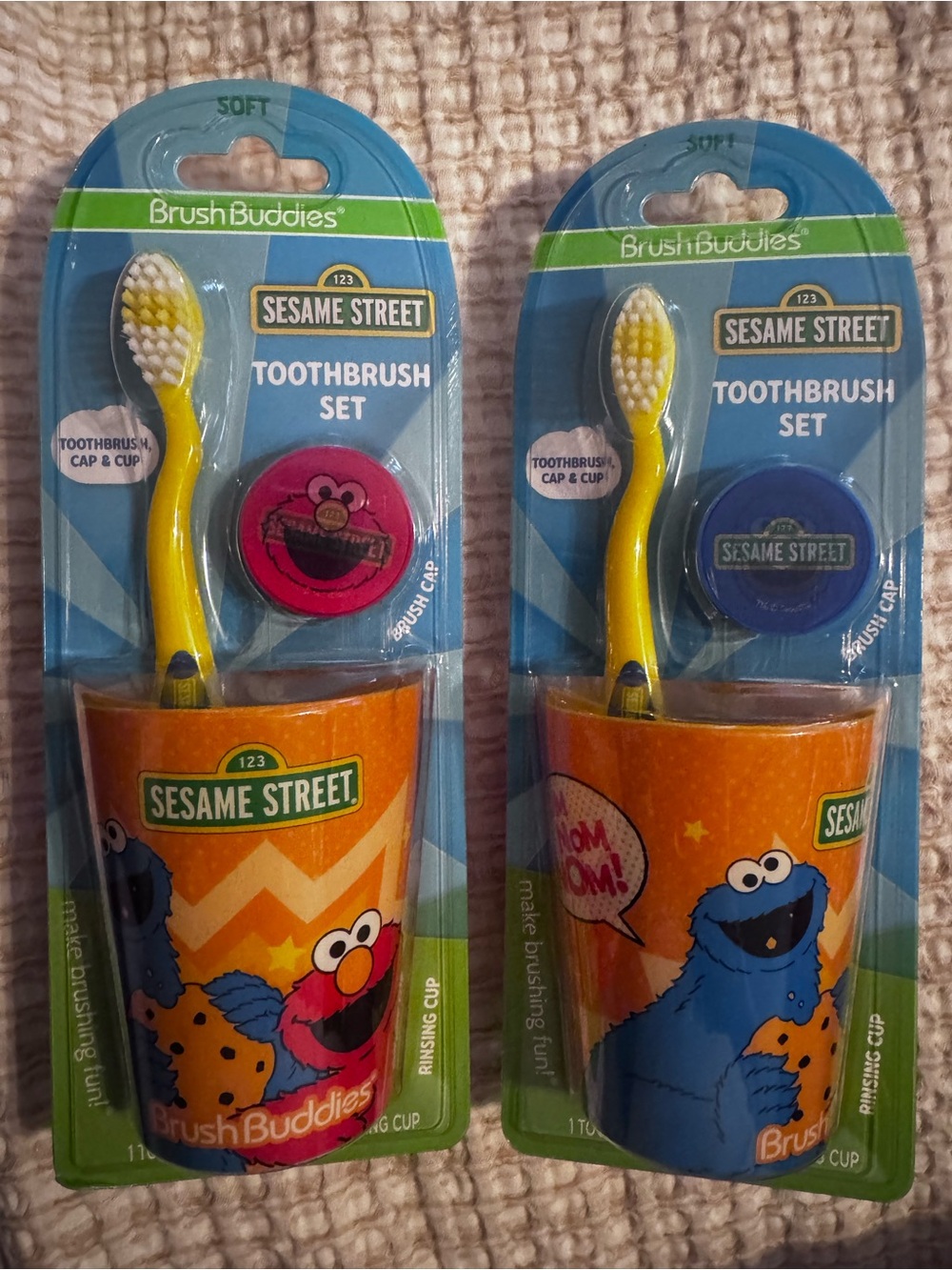 Sesame Street Orange Character Toothbrush Set with Pink and Blue Caps